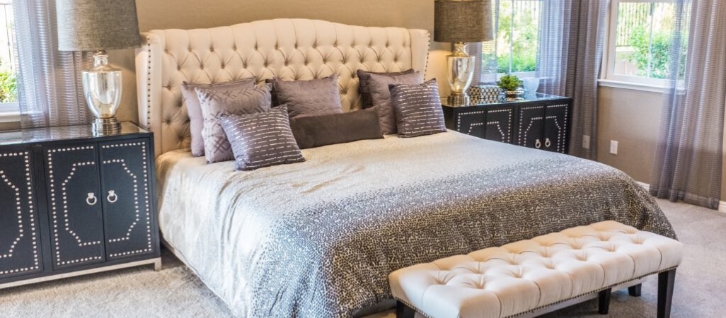 luxury bed and nightstands in a bedroom
