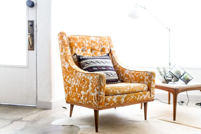 vintage mid-century modern orange and white chair