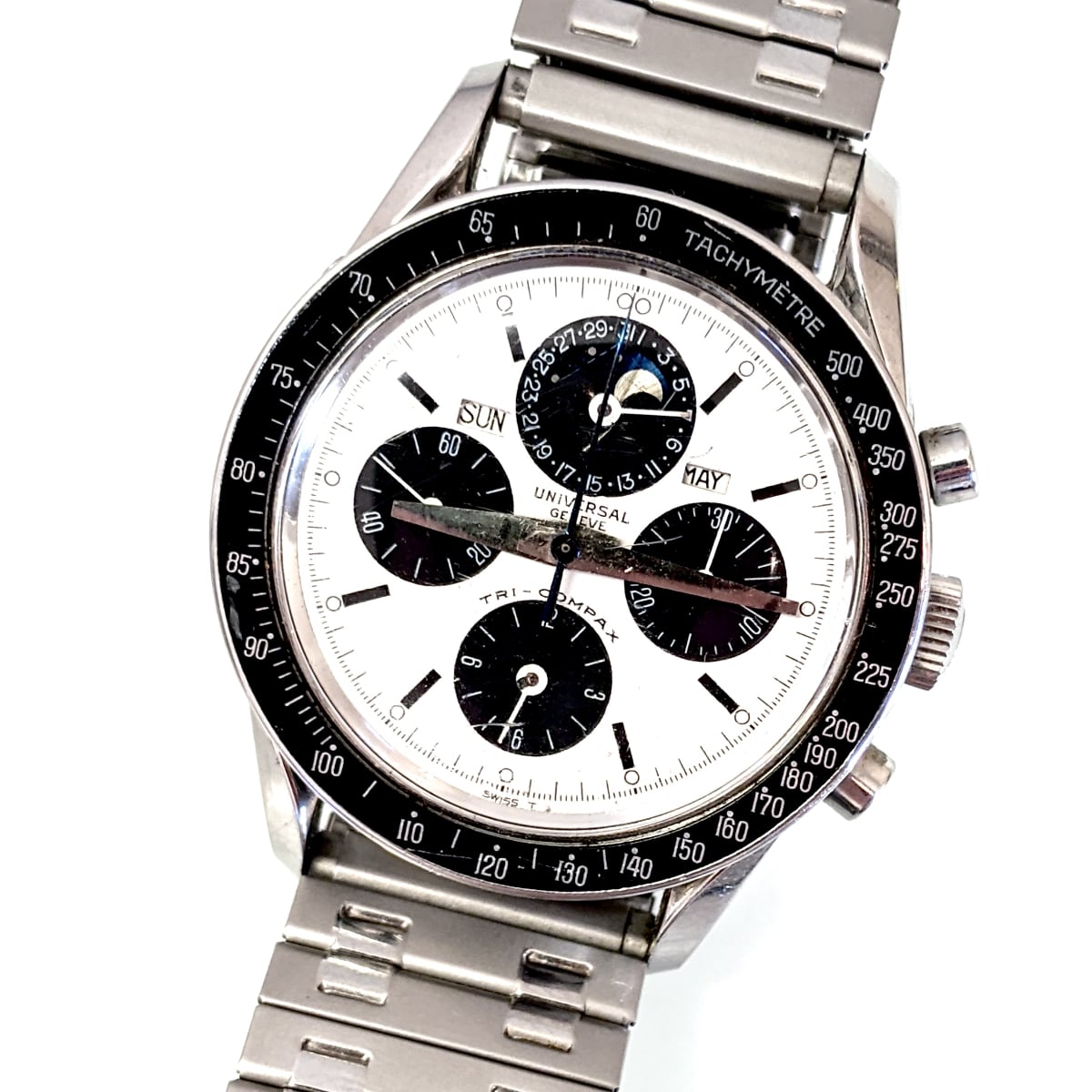 Expensive silver watch with white face
