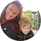 young woman with red hair and child with blonde hair