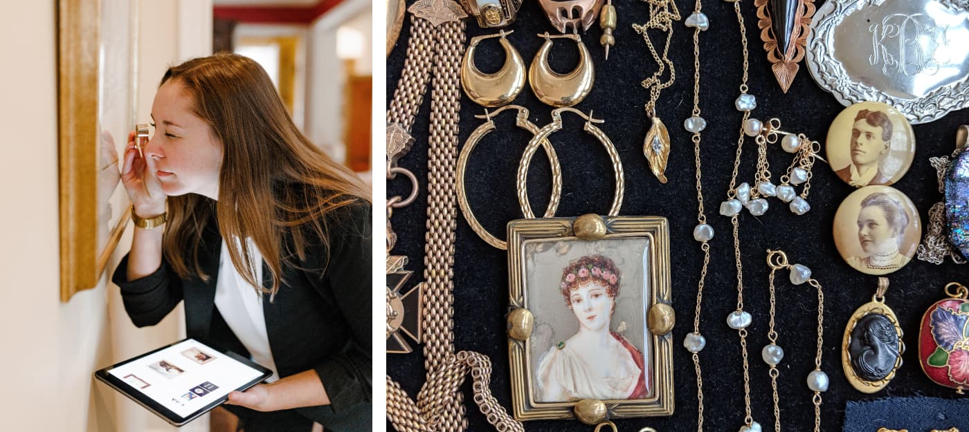 Allison Ruby using a loop to look closely at artwork and a selection of jewelry laid out on cloth