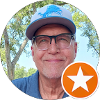 Google profile image of Dan K; a smiling older man with glasses and a Detroit Lions hat